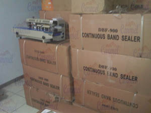 mesin sealer ban berjalan