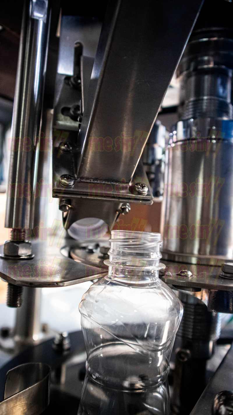 mesin penutup botol otomatis